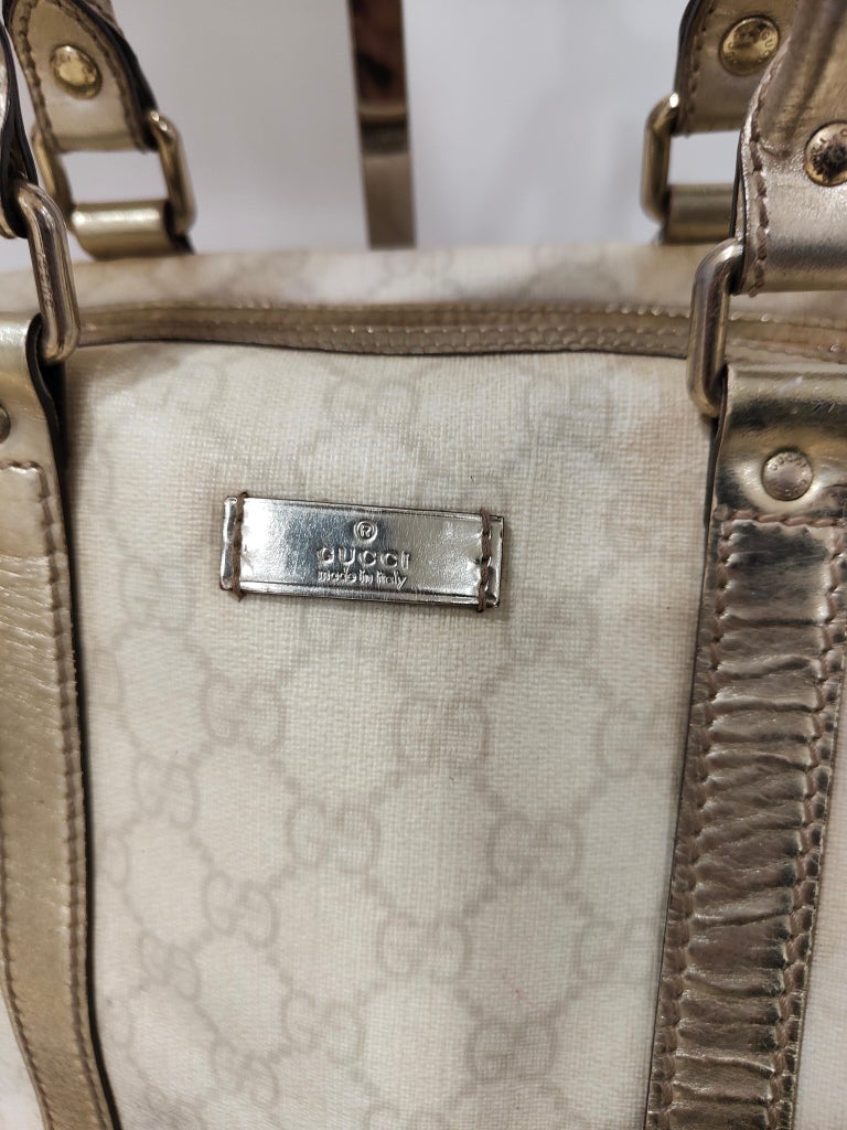Gucci monogram gg gold leather speedy bag at 1stDibs