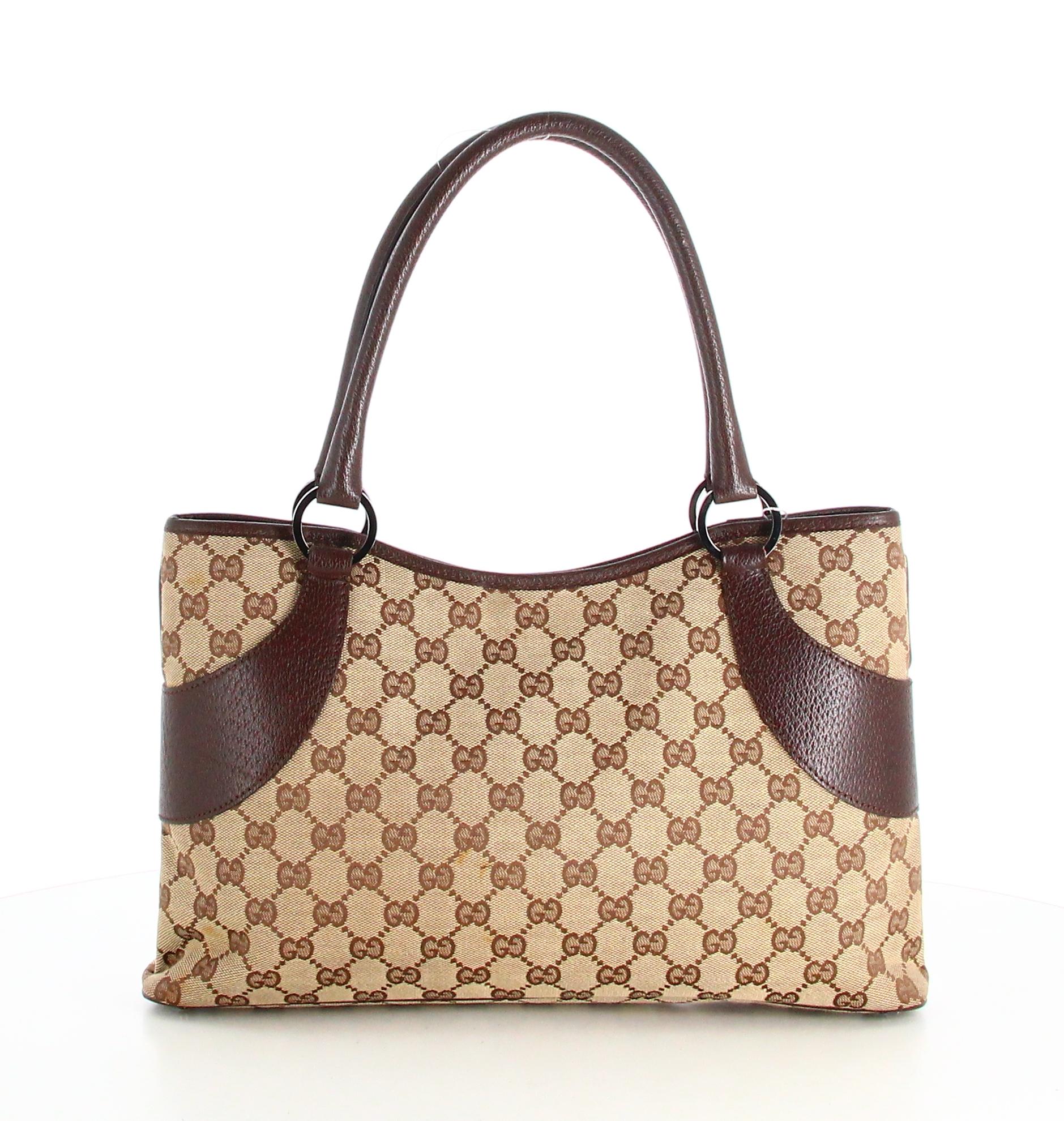 Gucci Monogram Handbag

- Good condition. Slight traces of wear over time. 
- Gucci Handbag 
- Monogram beige 
- Brown leather strap 
- Clasp: Magnetic button
- Inside: brown lining plus inside pocket
