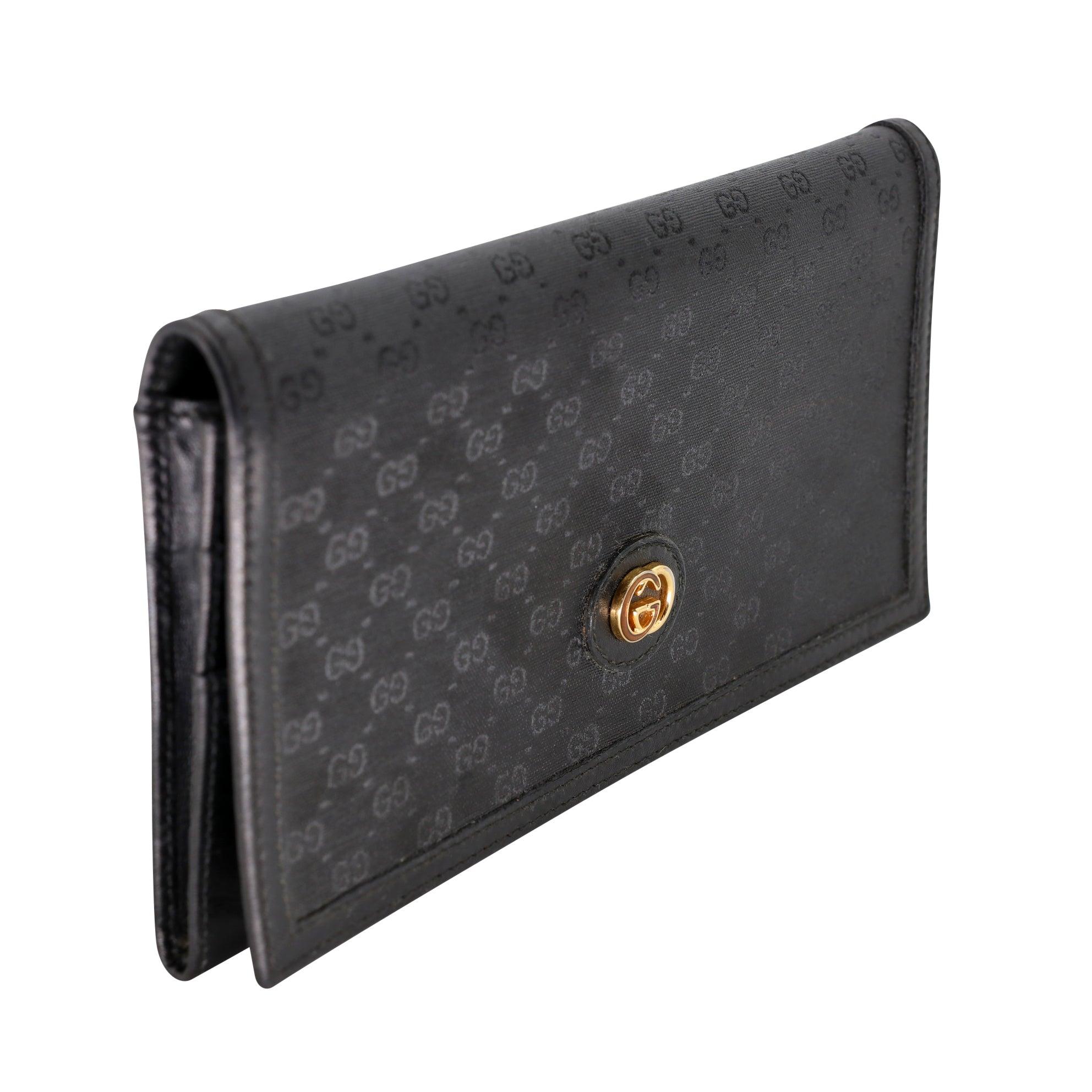 The Italian fashion house of Gucci continues to reinterpret its rich heritage with decidedly modern, yet classic designs. This wallet features the distinctive GG gold metal logo. Wallet is in pre-loved condition with basic wear there is some scuffs