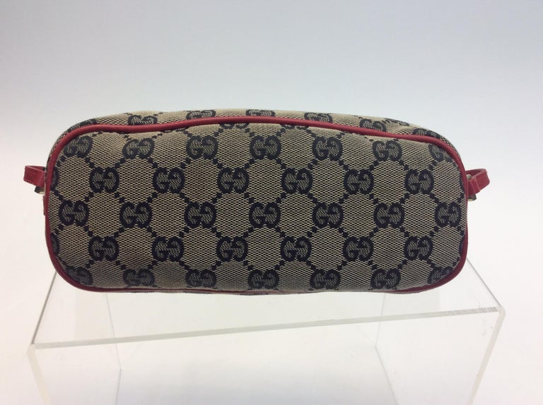 Gucci Monogram Mini Handbag with Red Strap For Sale at 1stdibs