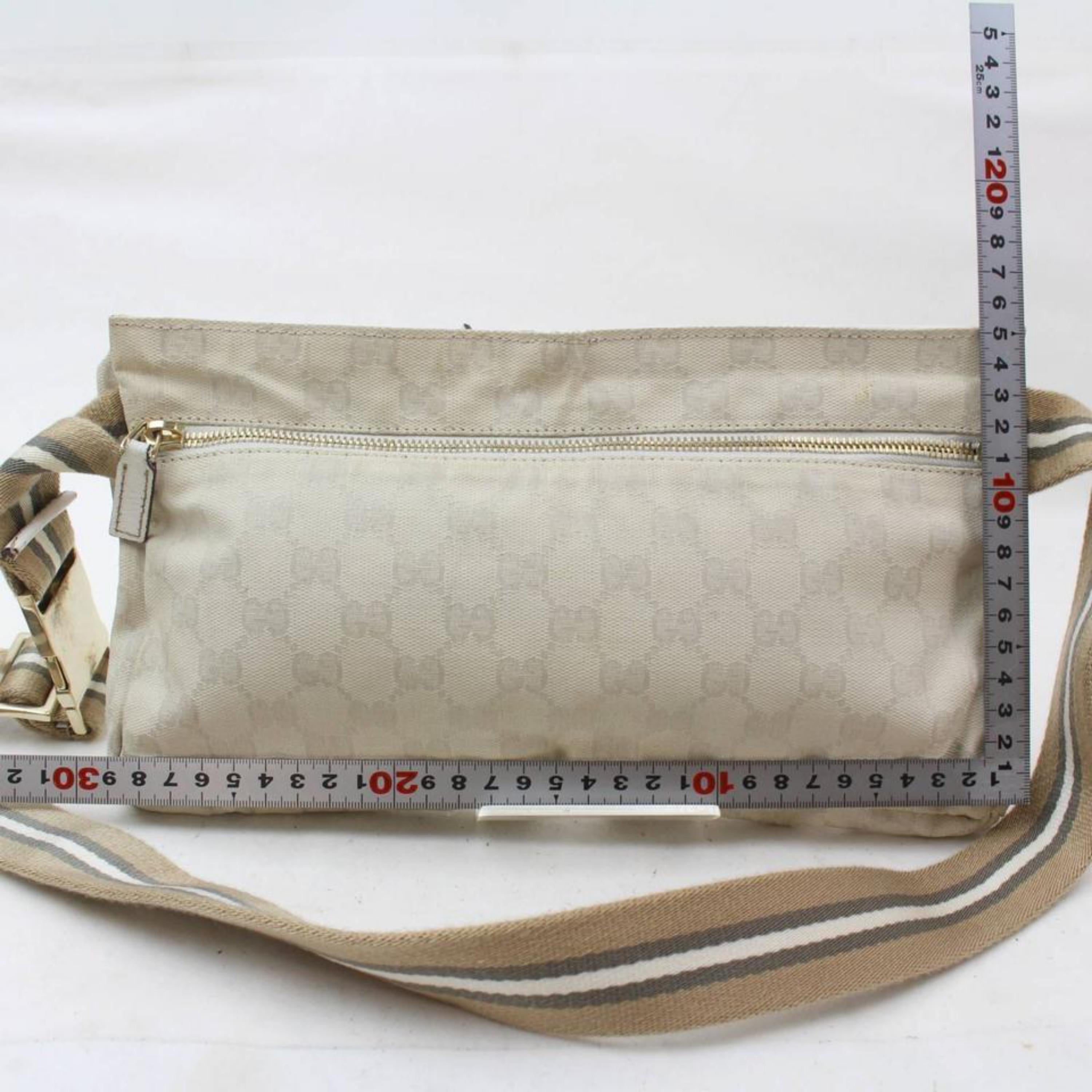 Gucci Monogram Signature Belt Fanny Pack 868779 White Canvas Cross Body Bag In Good Condition For Sale In Forest Hills, NY