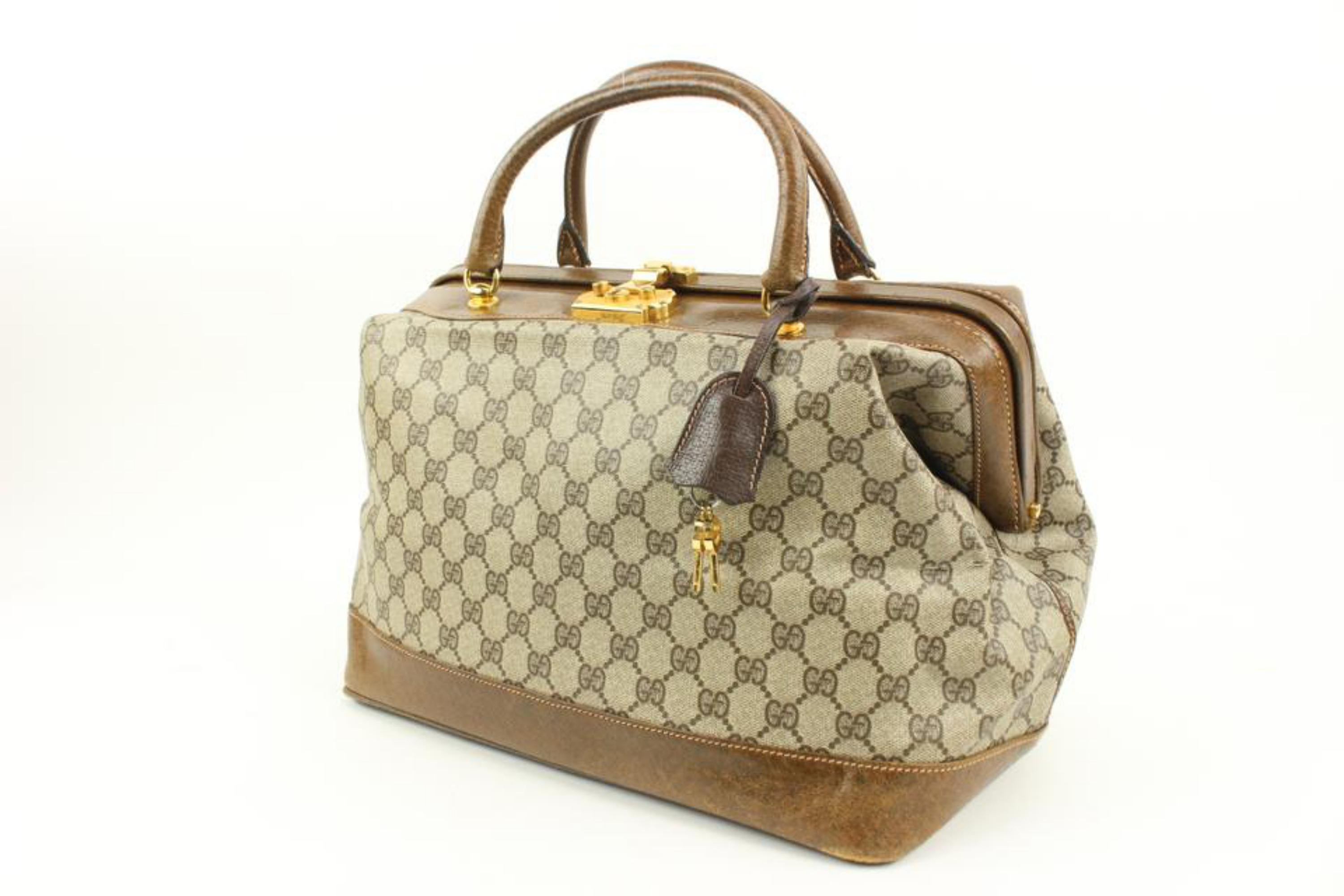 Gucci Monogram Supreme GG Doctors Bag 59g218s
Made In: Italy
Measurements: Length:  13.5