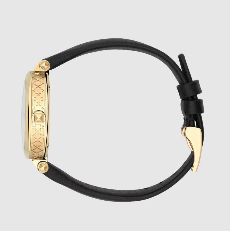 Gucci Light Yellow Gold PVD Case with White Mother of Pearl Dial, Black Leather Strap
Quartz Movement
32mm
Water resistance: 5 ATM (160 feet/50 meters)
YA141404