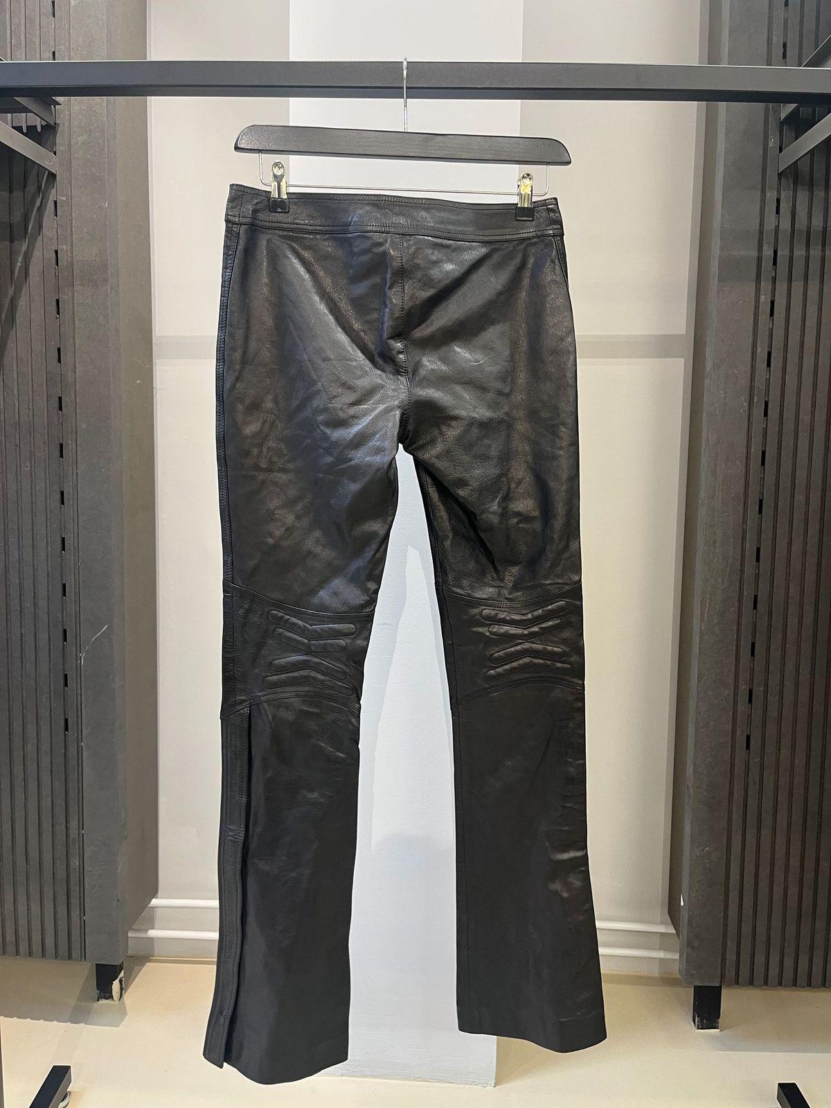 Gucci
Moto Belted Leather Pants
Size 30 inch

Beautiful leather pants by Gucci featuring moto applications on the knees and zippers. Very rare piece. In great condition without any flaws, made in Italy.
