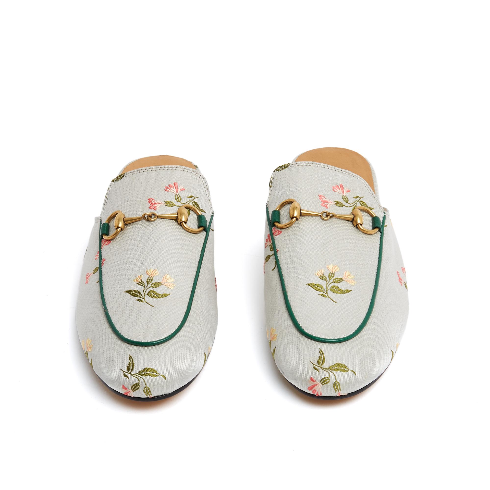 Gucci Princetown mules in sky blue canvas with floral pattern and gold metal Horsebit or Horsbit motif. Size 38.5EU or UK5.5 and US8, 1 cm heel, 25 cm insole (runs a little small). The mules have never been worn, perfect as socks or on a pretty