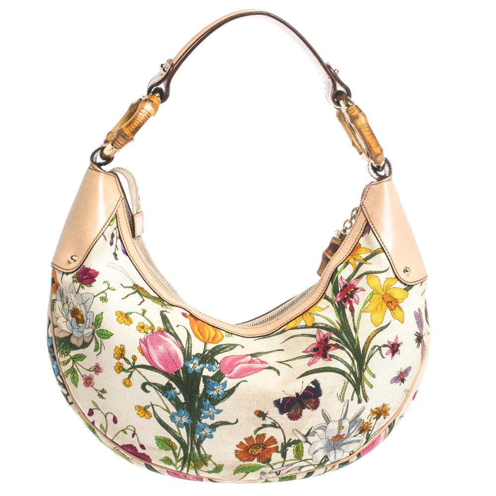 Hobos are all the rage with fashionistas at the moment, especially if designed by Gucci. This pretty multicolored hobo is crafted out of canvas and leather and features a bamboo ring-detailed strap. With a canvas-lined compartment and a zip pocket