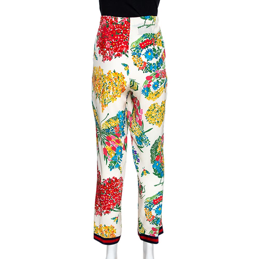 These pajama pants from Gucci blends luxury and comfort. It comes made from silk and features signature stripe panels and colourful prints all over. The pants have pockets, button closure and a stretchable waistband.

