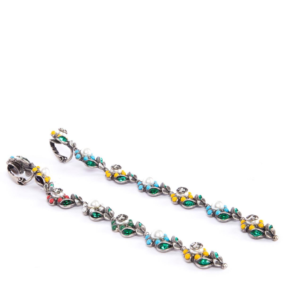 100% authentic Gucci daisy flowers drop ear-clips in ruthenium plated brass with multicolored beads, green Swarovski crystals and faux pearls. Have been worn and are in excellent condition.

Width 1cm (0.4in)
Length 13cm (5.1in)
Hardware Ruthenium