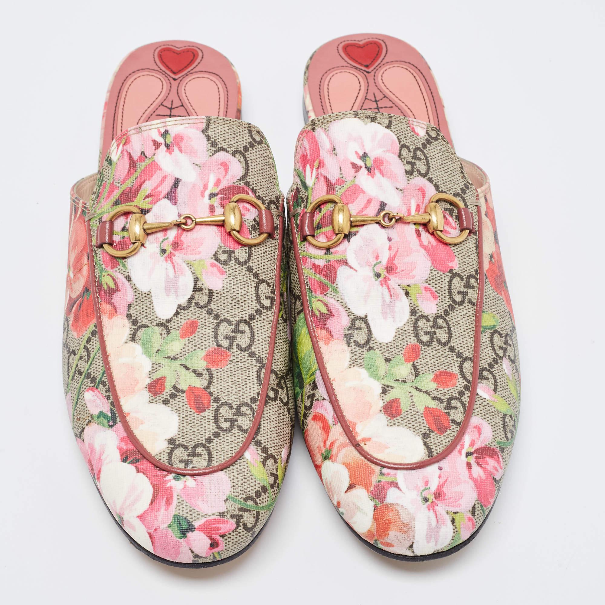 These Gucci Princetown mules signify luxury and practicality. An ultimate favorite of style enthusiasts, the silhouette of this pair gets a luxe update with the Horsebit motif on the uppers. It comes made from floral coated canvas with striking