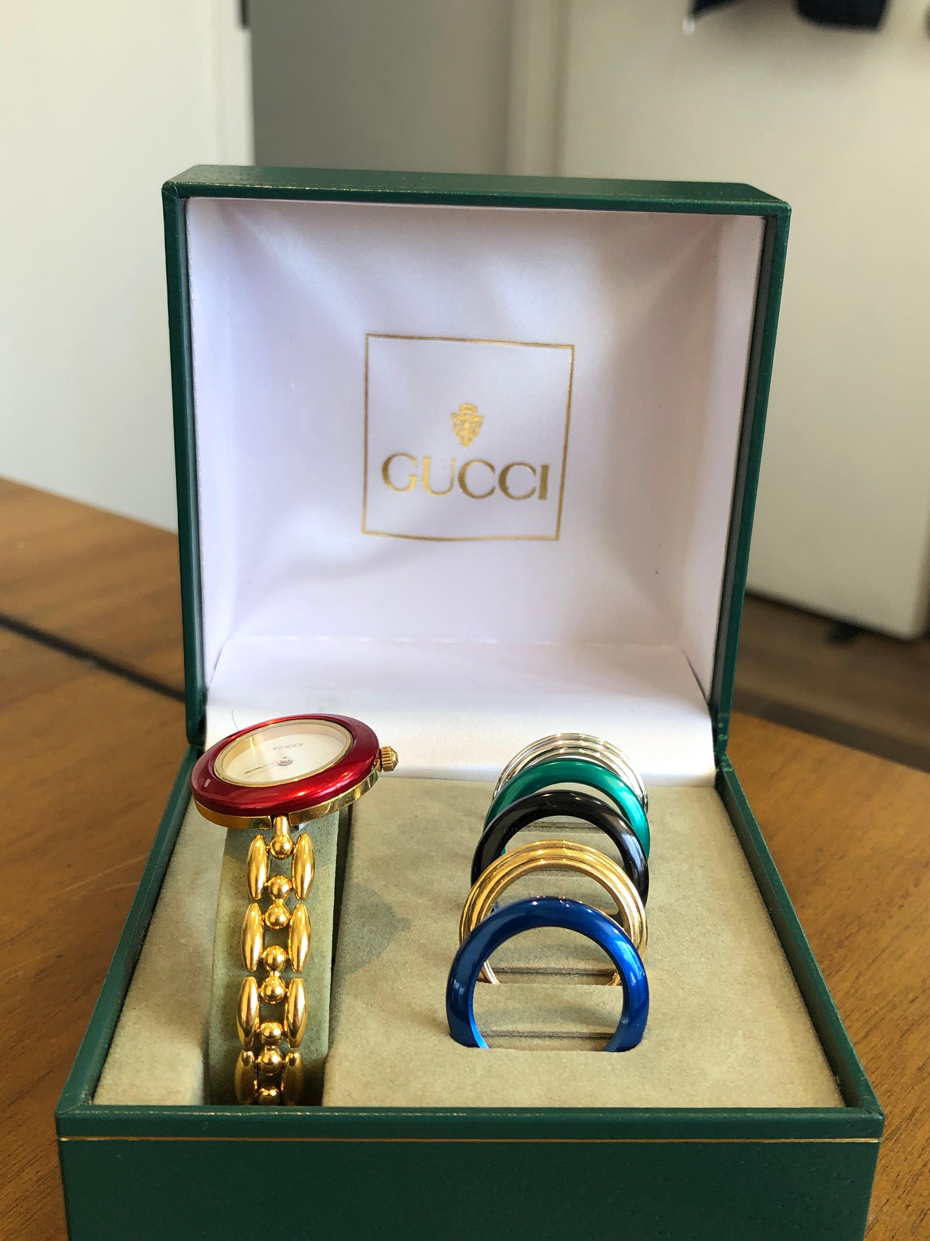 Brand: GucciVintage Gucci Interchangeable Bezel Watch12 SeriesRice Links BraceletGold Tone/Stainless SteelWhite DialQuartz MovementSwiss MadeGuarantee to be Authentic or your money back.Certificate of Authenticity from Professional Authenticator is