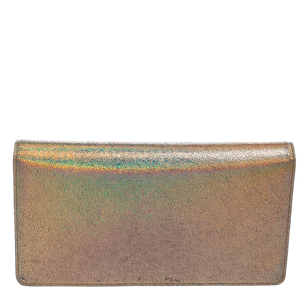 This iridescent, crackled leather clutch from Gucci is perfect for special occasions and parties. It flaunts a gorgeous multicolored hue along with gold-tone hardware. It is complete with a well-sized interior to hold your essential items with