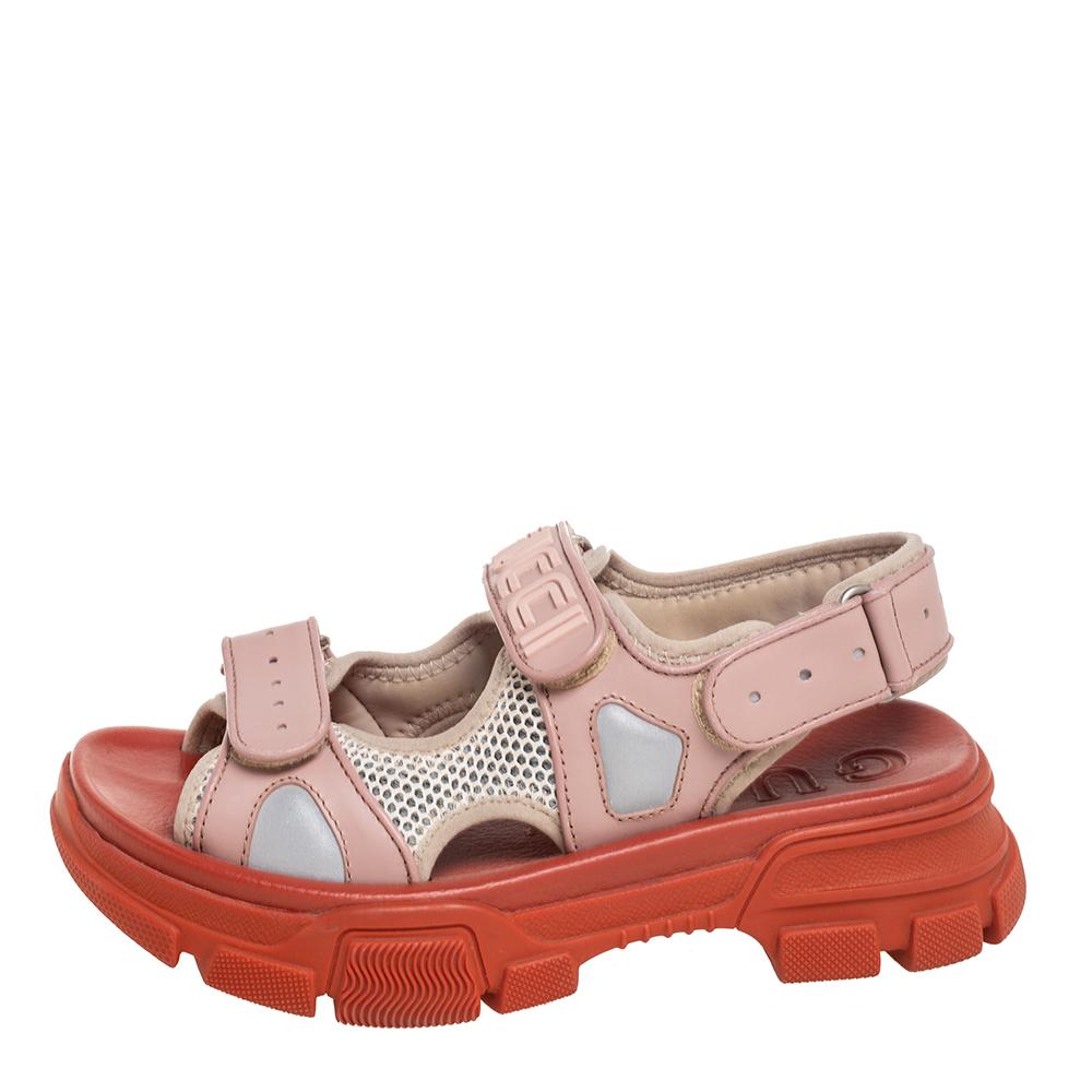 Give your feet some comfy yet chic shoes to wear with these Gucci multicolored sandals. They have been made from leather and mesh and have an open-toe silhouette with a chunky design. They'll look super-stylish when teamed with crop tops and shorts.