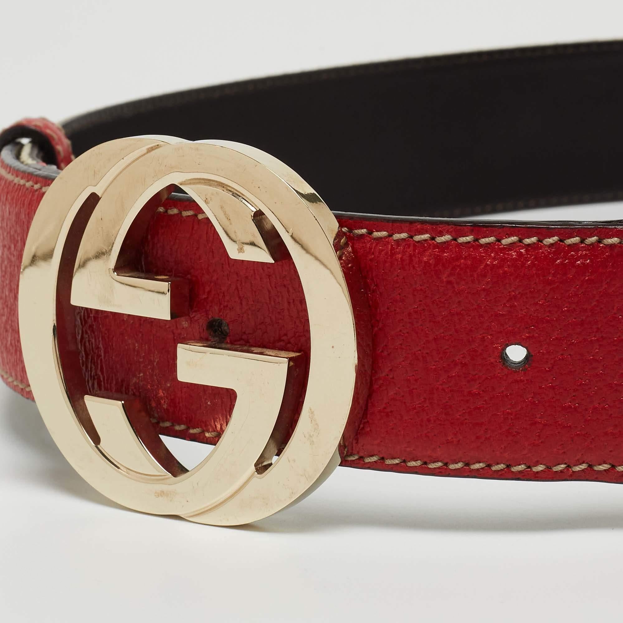 Light up your belt collection by adding this buckle belt from Gucci. Made from canvas and leather, it features the signature web design, and the piece is complete with the iconic interlocking G buckle in gold-tone, accompanied by a single loop. This