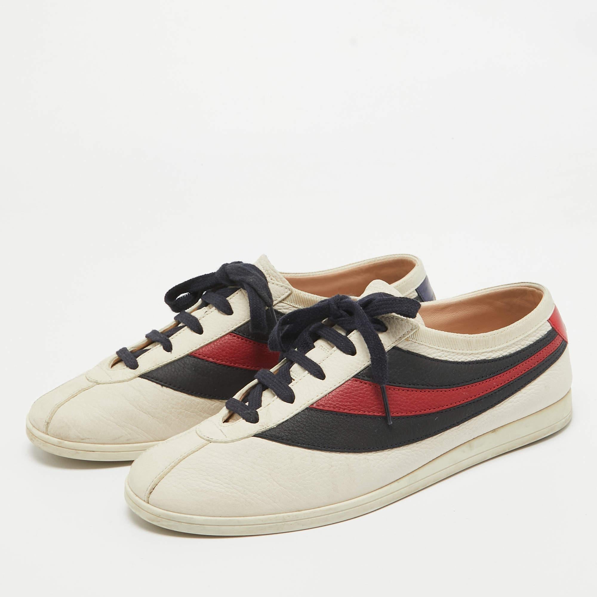 These adorable sneakers are from Gucci. Theyve been crafted from patent leather and designed as round toes with other details such as lace ups and butterfly appliques on the uppers. The sneakers will offer both comfort and style.