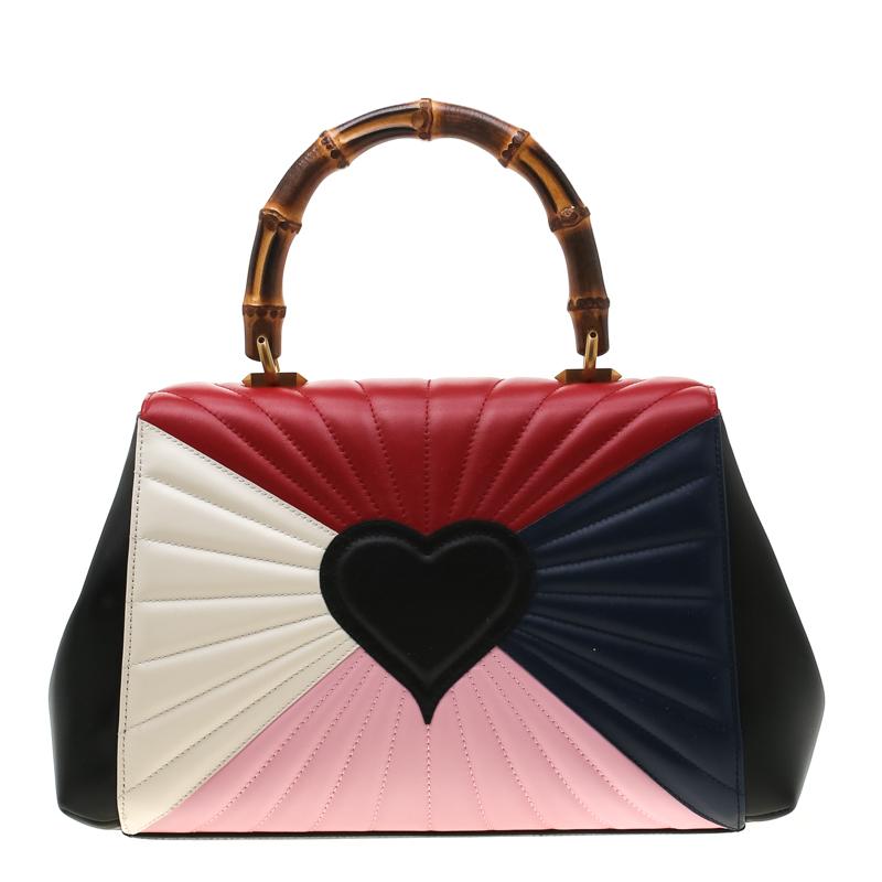 This beauty is from Gucci's 2017 collection and it is a sight to behold! It is excellently crafted from leather and designed to make every handbag lover swoon. The bag holds a sunrise-like quilt all over, colour blocks in four shades, and an