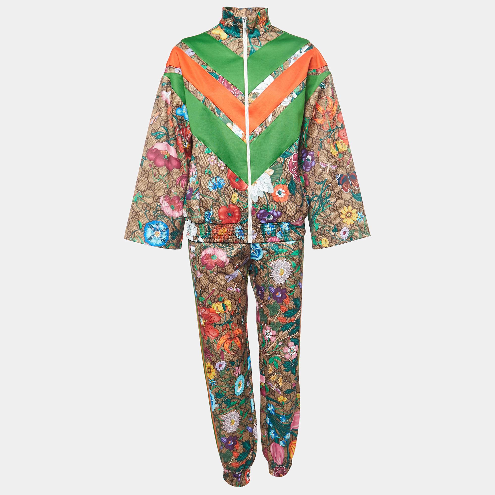 Get that Gucci fit right with this sweatshirt & joggers set. Tailored with care, the set is presented in classic GG print fabric with colorful floral prints for a stunning finish.

