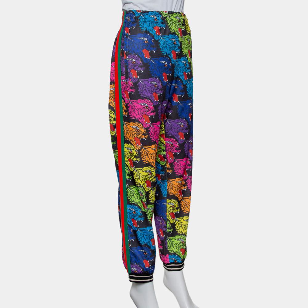 Who knew jogger pants could be so stylish! These multicolor ones from Gucci are made of quality materials and styled with a panther face print all over. Equipped with two pockets, they are comfortable to wear and will surely lend you a great fit.

