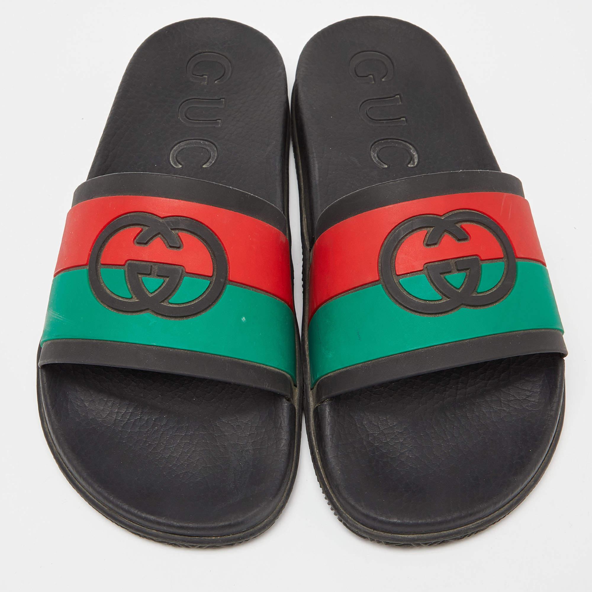 Gucci's rubber slides for men have the Web & GG branding on the uppers. They're perfect for the beach, vacation days, or everyday use.

