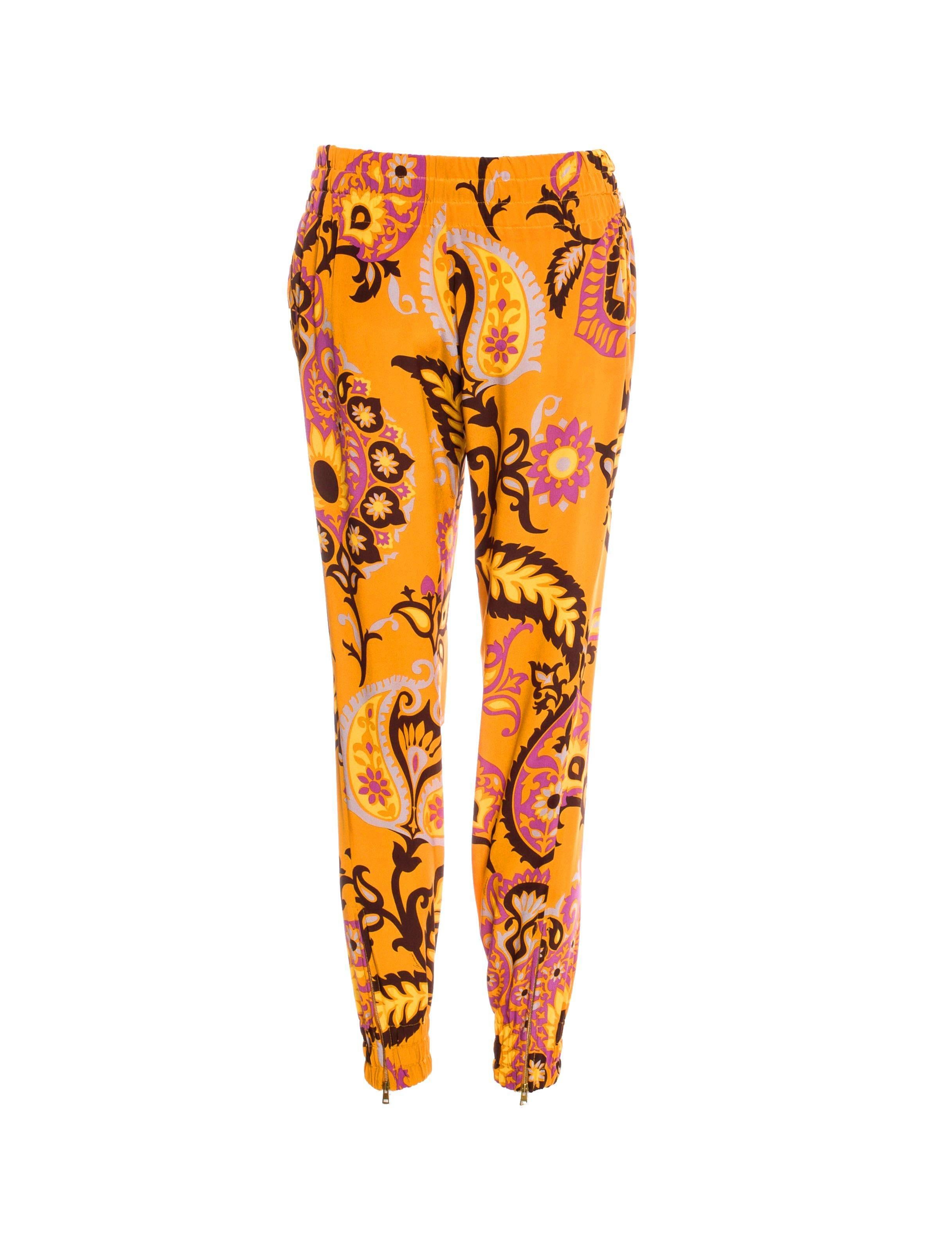 Printed silk pants by Gucci
Finest printed silk with paisley pattern
    Elastic waistband with drawstring
    Elastic leg openings with zip detail discreetly engraved with 