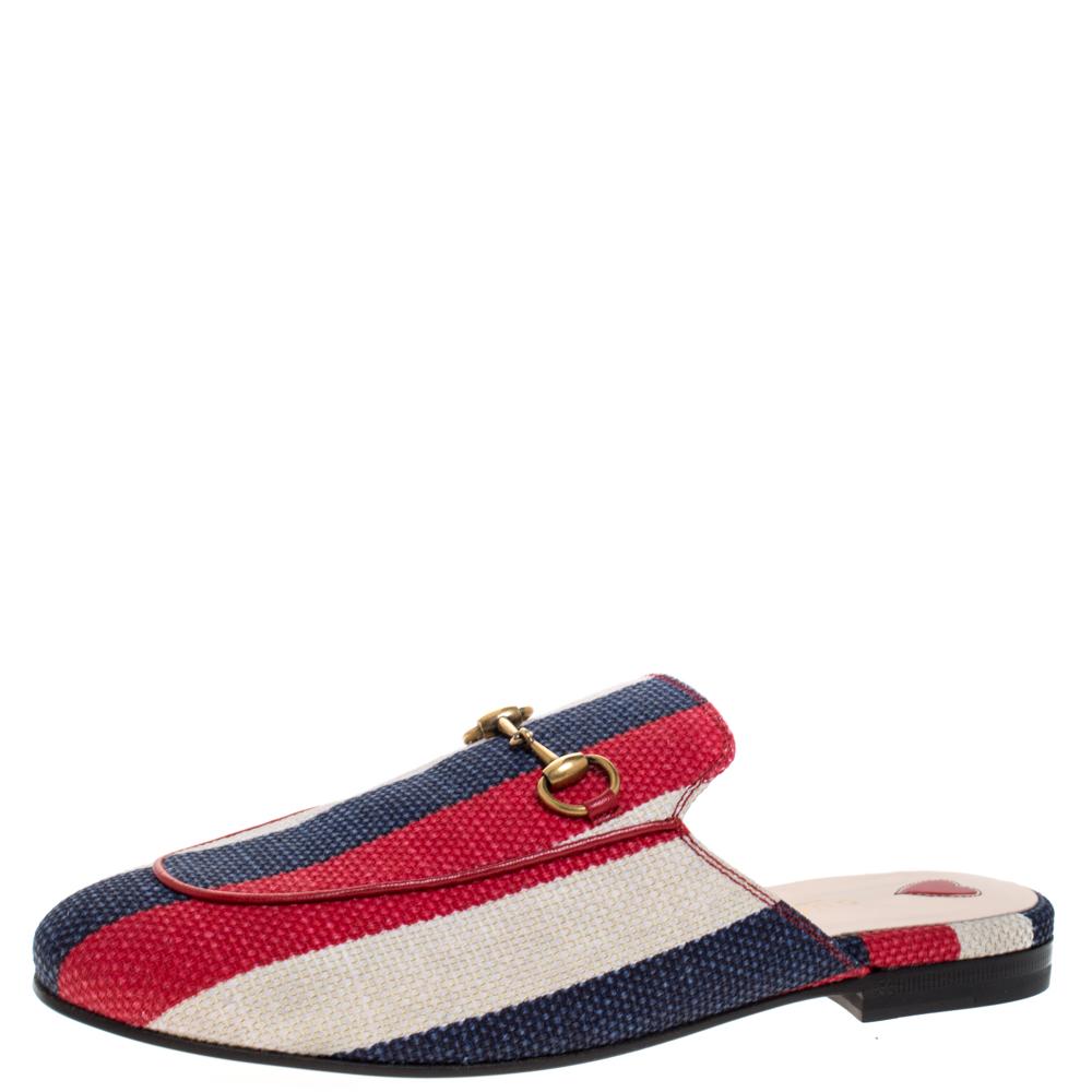 Gucci first launched the Princetown style as part of their Fall Winter 2015 collection and it lit up a trend that refuses to die down. This pair here has been crafted in Italy and is made of striped canvas. They feature round toes and the signature