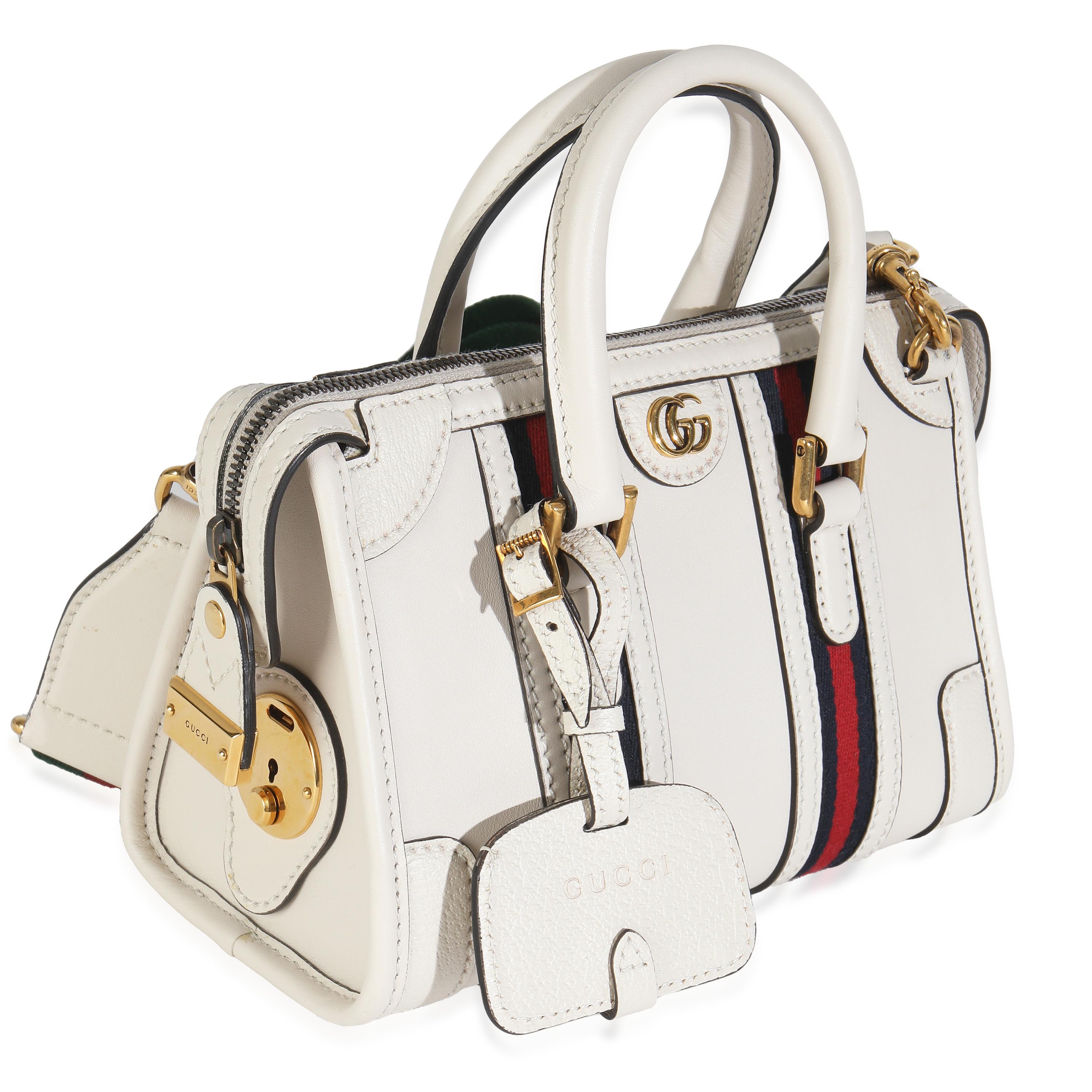 Listing Title: Gucci Mystic White Koi Calfskin Small Bauletto Duffle Top Handle Bag
SKU: 147938
Condition: Pre-owned 
Condition Description: The green and red Gucci Web was created in 1964 and has since been considered a recognizable signature of