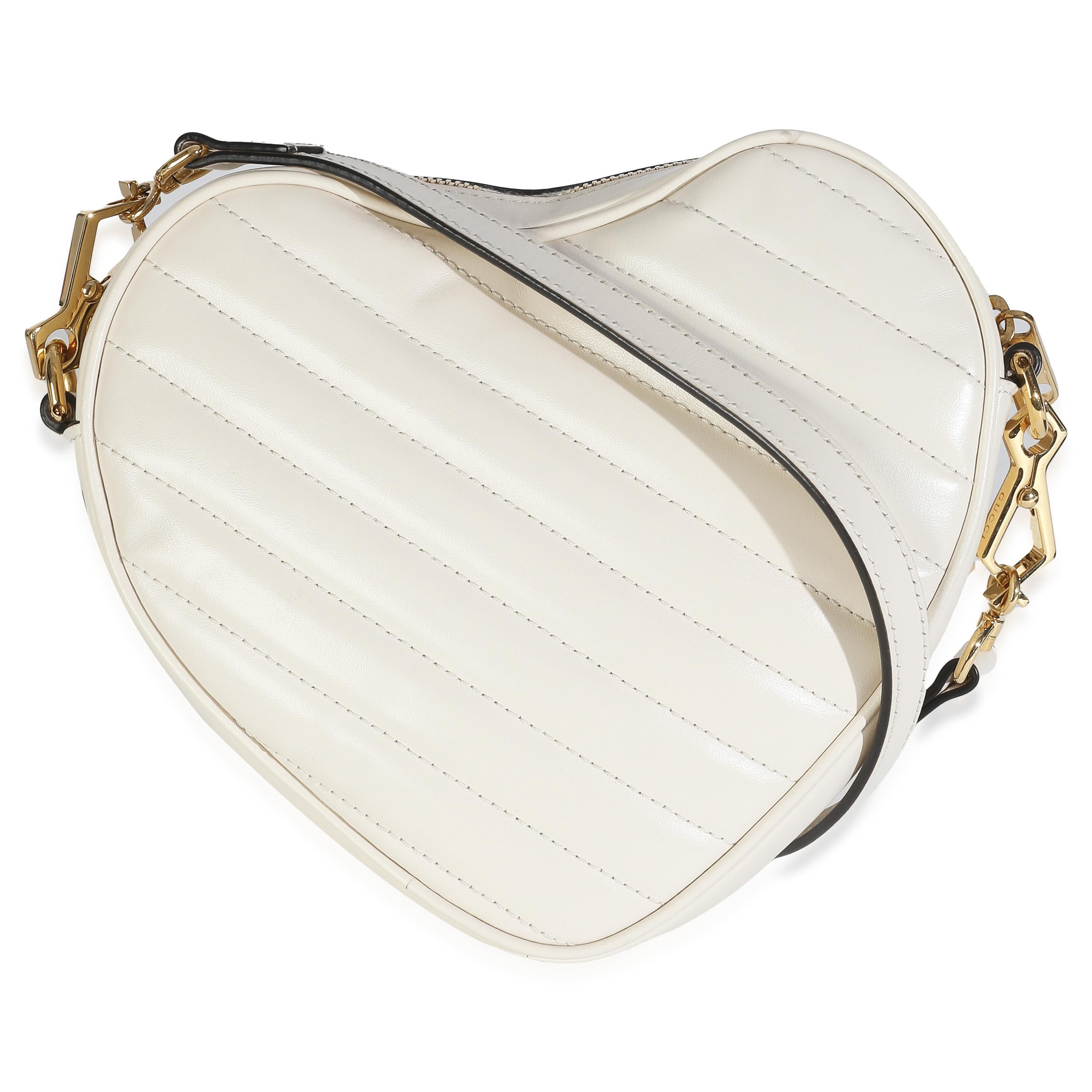 Título del listado: Gucci Mystic Blanco Matelasse Piel de Becerro Diagonal Mini Bolso Corazón G Entrelazado
SKU: 147895
MSRP: 2250.00 USD
Estado: Seminuevo 
Descripción del estado: La colección Neo Vintage GG Supreme de Gucci rinde homenaje a las