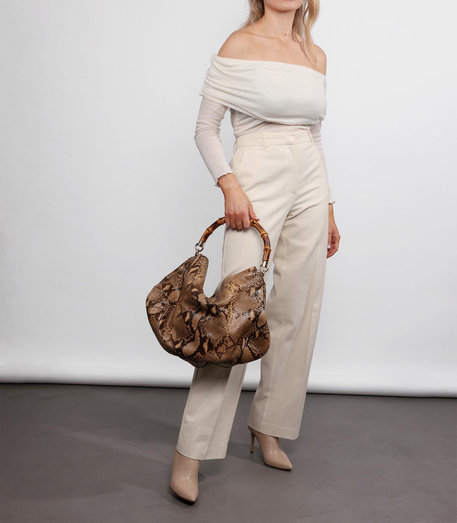 Gucci Natural Python Leather Vintage Peggy Bamboo Hobo Bag

Brand- Gucci
Model- Peggy Bamboo Hobo Bag
Product Type- Shoulder, Top Handle
Serial Number- 16*********
Accompanied By- Gucci Dust Bag
Colour- Natural
Hardware- Gold
Material(s)- Python