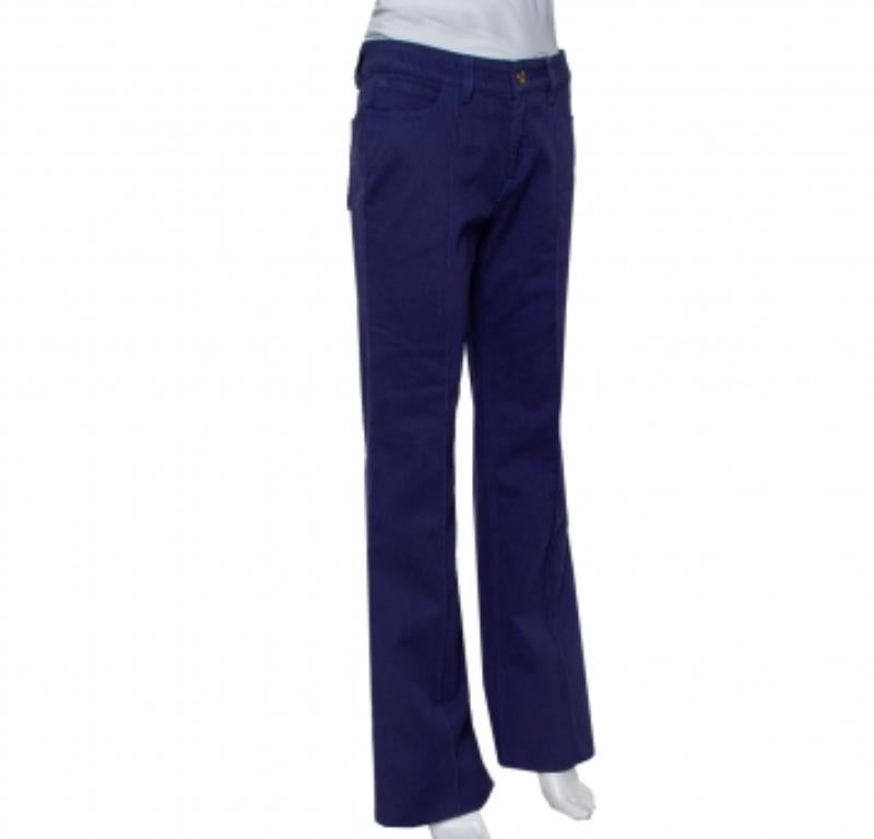 These jeans from Gucci will prove to be an amazing buy! They are made of navy blue denim fabric in a flared leg silhouette and styled with panels, belt loops, a front button and zip fastening, and five pockets. They'll look great with your T-shirts