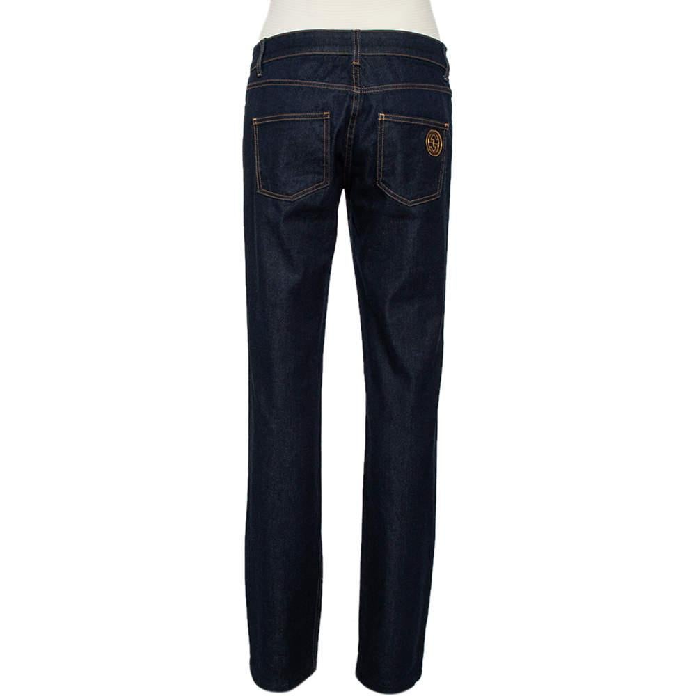 Jeans are wardrobe staples and the epitome of casual style. These Gucci jeans are perfectly tailored to deliver a straight fit that is flattering. Crafted from cotton denim, they come in a lovely shade of navy blue. They are styled with five pockets