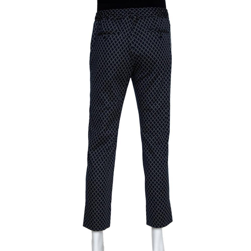 To give you comfort and high style, Gucci brings you this navy blue creation that has been made from quality cotton fabric and designed with a G Frame print all over. This pair of pants will surely be a delighting buy.

Includes: Price Tag
