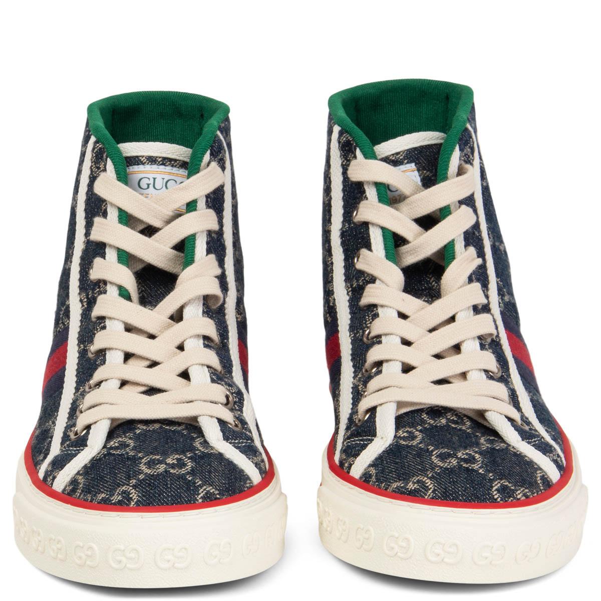 100% authentic Gucci Tennis 1977 high-top sneakers crafted from navy blue organic jacquard denim. With an allover GG motif and signature red/blue Web stripe on the side. Brand new. Come with dust bag. 

Measurements
Imprinted Size	37.5
Shoe