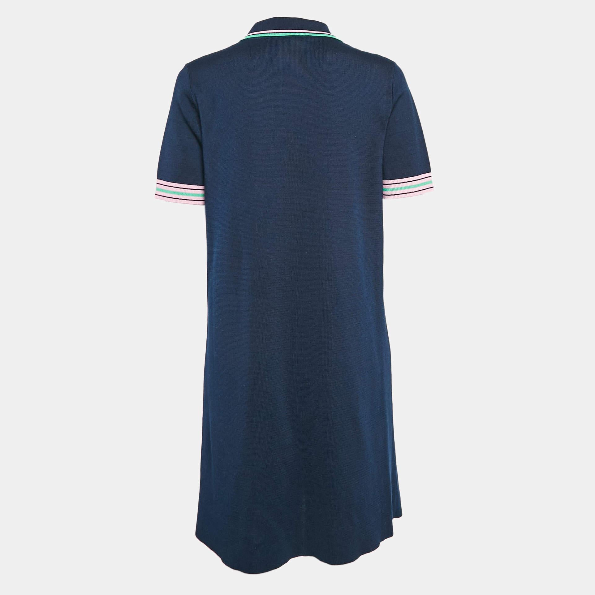 Effortlessly made into a chic design this Gucci navy blue dress is easy to wear and easy to accessorize. Tailored beautifully the short dress is sure to remain a favorite season after season.
