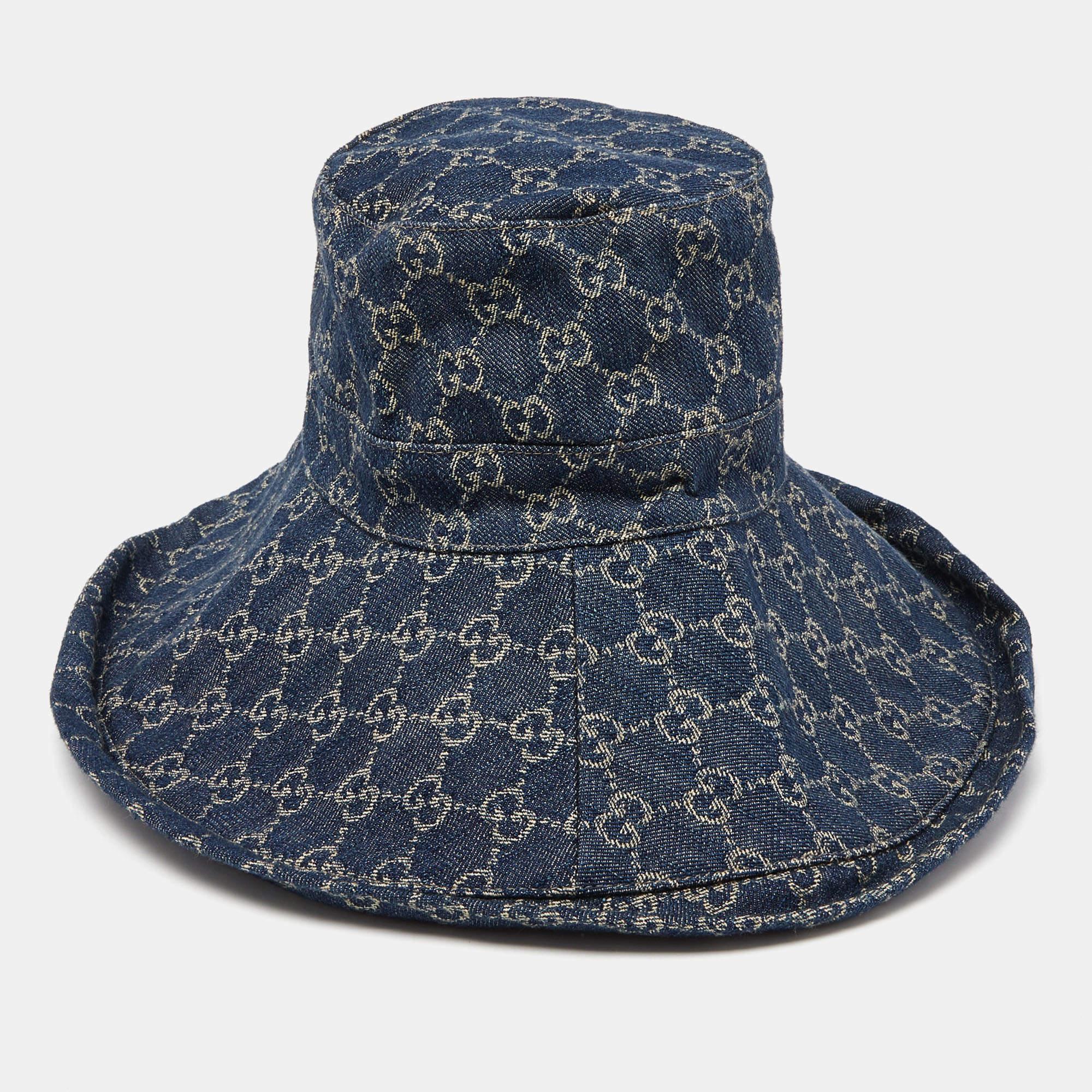 Head out looking chic with this bucket hat from Gucci. It has been made using Monogram denim, thus making it the perfect summer accessory. It has a wide brim.


