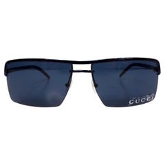 Lunettes de soleil Gucci bleu marine teintées à monture métallique rectangulaire circa Y2K