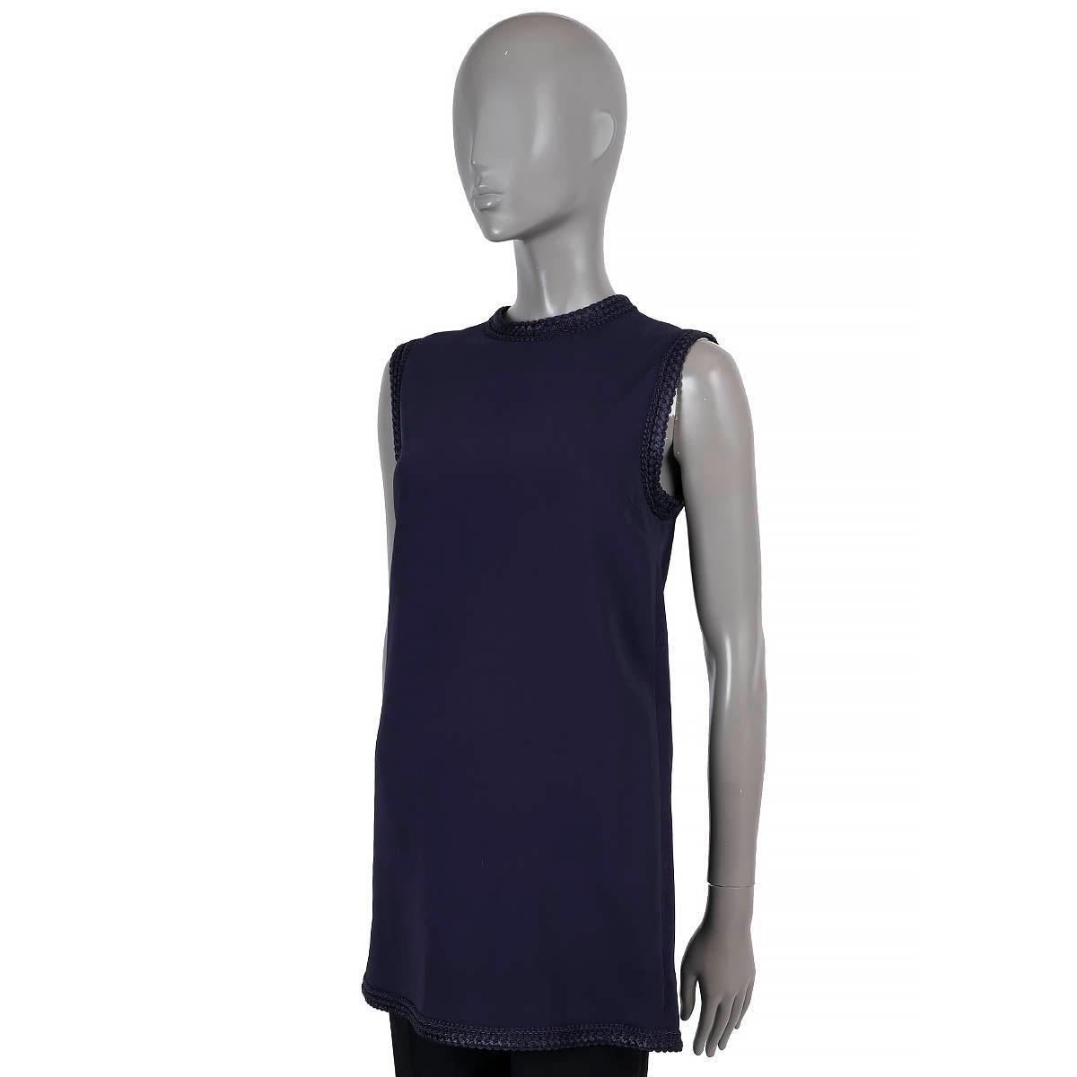 100% authenticGucci cady tunic top in navy blue viscose (97%) and elastane (3%). Features passementerie trims. Opens with a hook and zipper in the back. Unlined. Has been worn and is in excellent condition.

2019