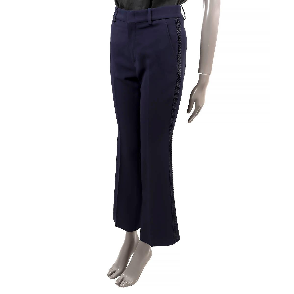 100% authentic Gucci passementrie trim stretch cady pants in navy blue acetate (69%), cotton (19%) and polyester (8%). Feature belt loops and two slit pockets on the sides and two slit pockets on the back. Open with one hook and a zipper on the