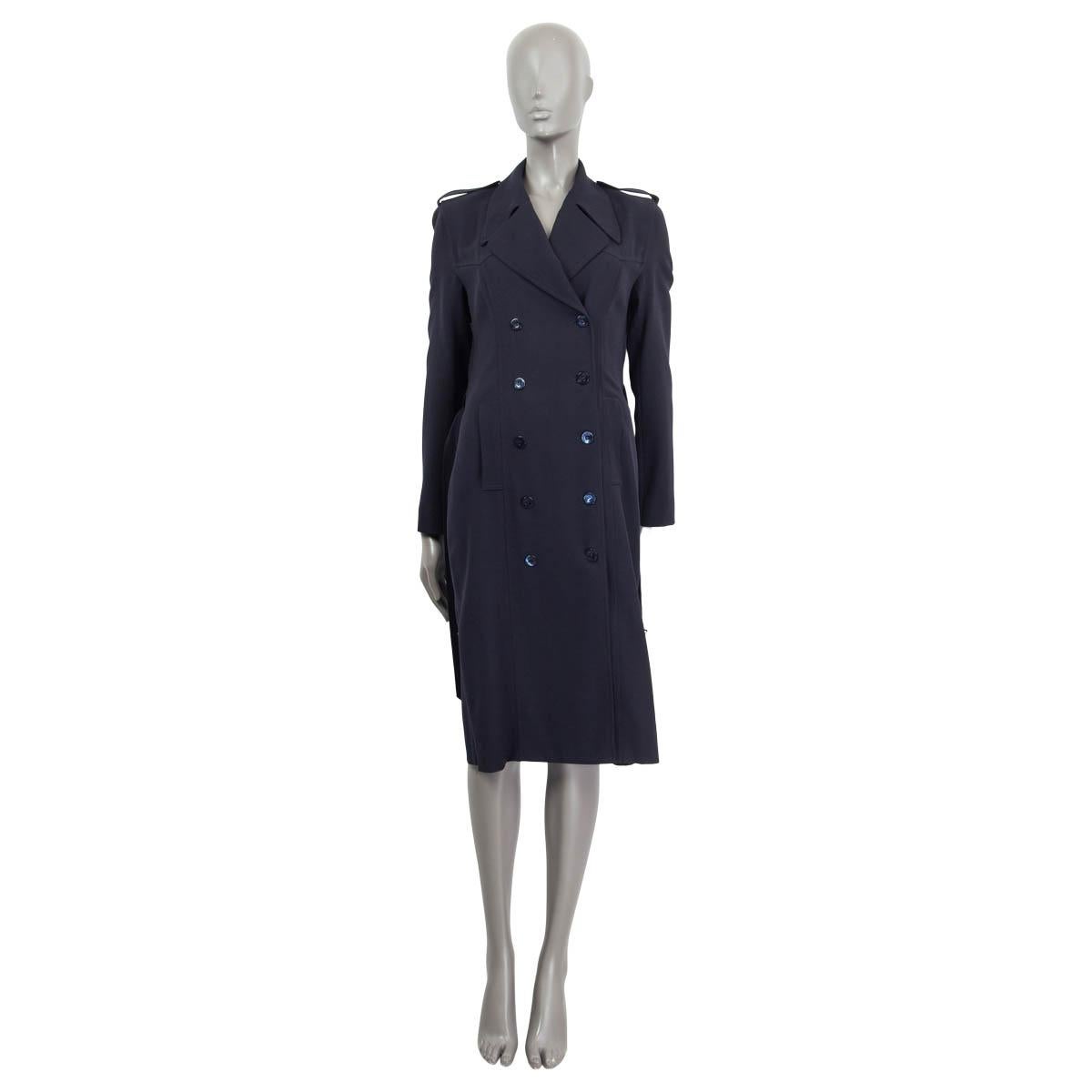 100% authentic Gucci trench coat in navy blue wool (100%). Comes with a matching belt and two slit pockets in the front. Embellished with epaulettes and opens with ten Gucci buttons on the front. Unlined. Has been worn and is in excellent condition.