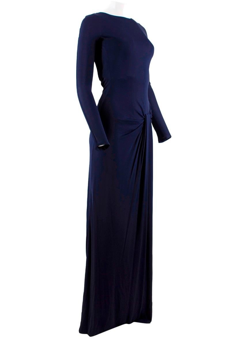 Gucci Navy Buckled Backless Gathered Gown

- Long sleeves
- Ruched detailing centre side
- Concealed rear fastening
- Maxi length
- Round neckline
- Black leather & silver tone metal belt and clip buckle fastening

Please note, these items are
