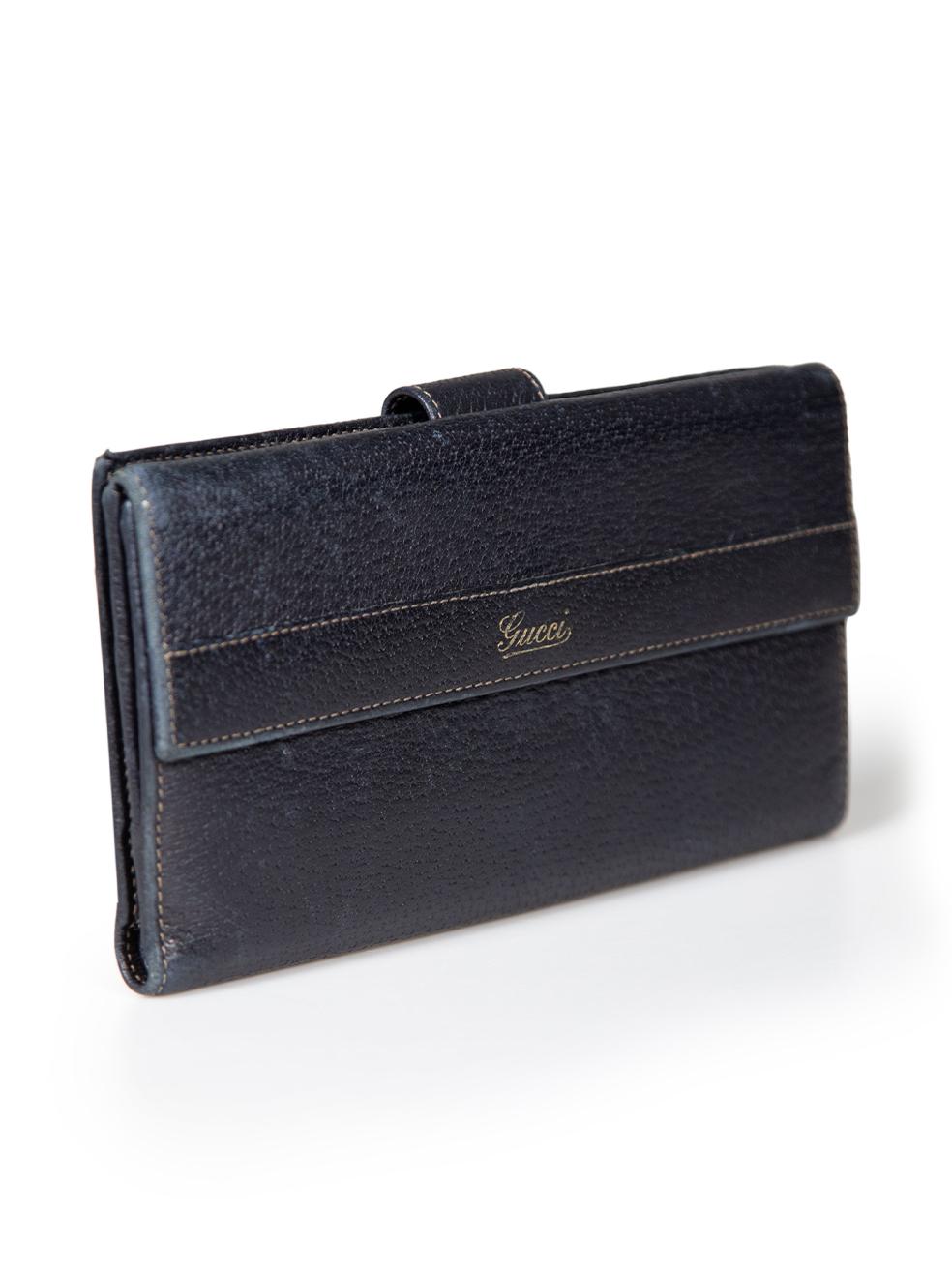 CONDITION is Good. Minor wear to wallet is evident. Light wear to the edges, corners and internal card holders with abrasion. Internal compartment edge has come undone on this used Gucci designer resale item.
 
 
 
 Details
 
 
 Navy
 
 Leather
 
