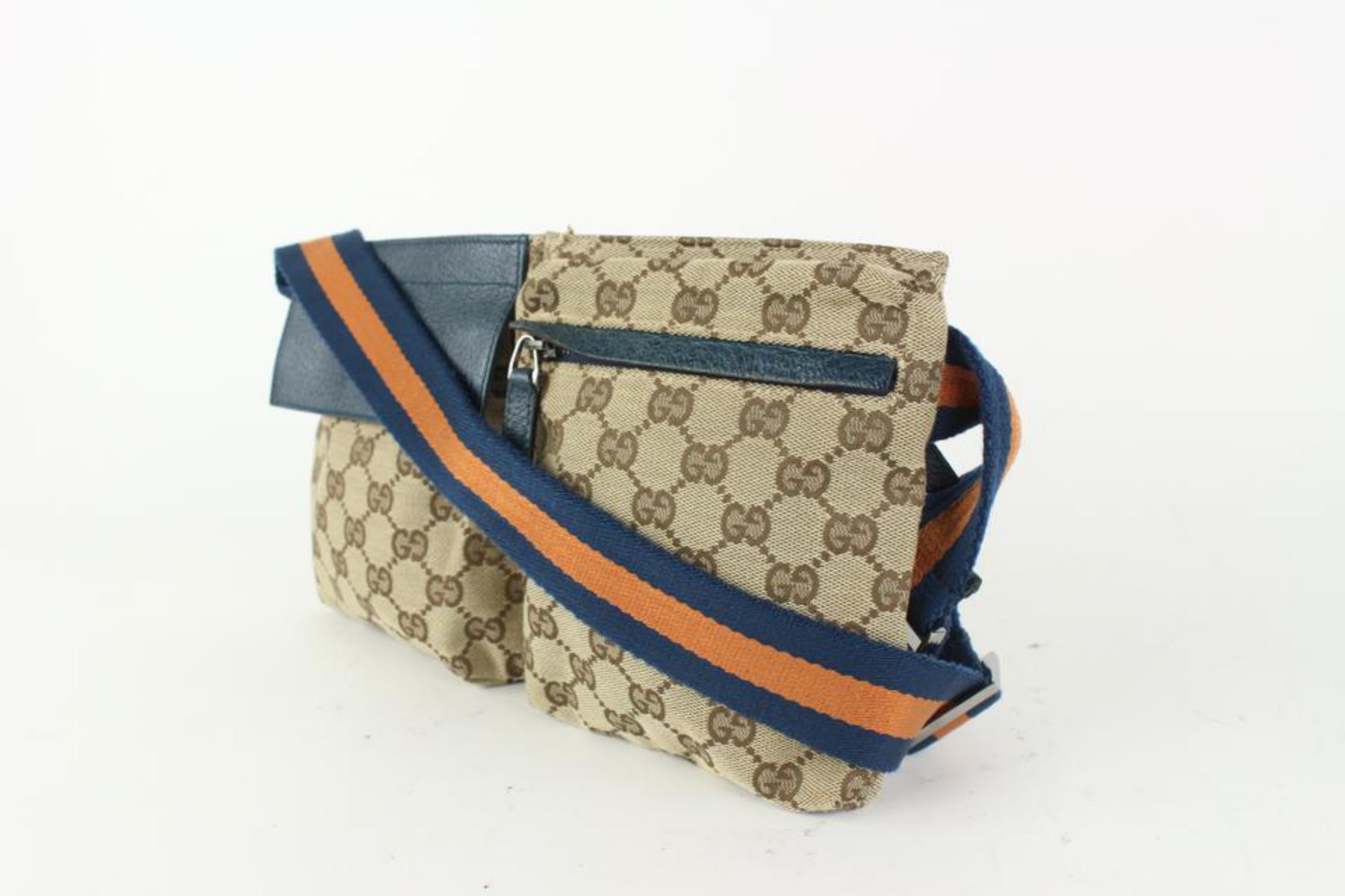 Gucci Navy x Orange Monogram Belt Bag Fanny Pack Waist Pouch 2GK110
Date Code/Serial Number: 28566 001013
Made In: Italy
Measurements: Length:  12