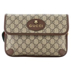 Gucci - Sac ceinture à rabat vintage en toile enduite GG, style néo-gothique