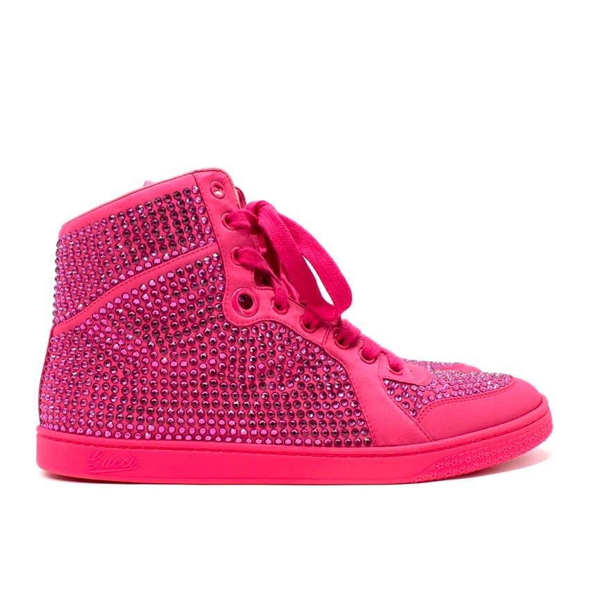 Gucci Neon Pink Crystal-Embellished Satin High Top Sneakers

- Neon pink satin upper, encrusted with hundreds of mini tonal crystals
- Leather lined, rubber sole
- Tonal lace-up
- Gucci embossed logo to the corner outsole

Materials:
Leather

Made