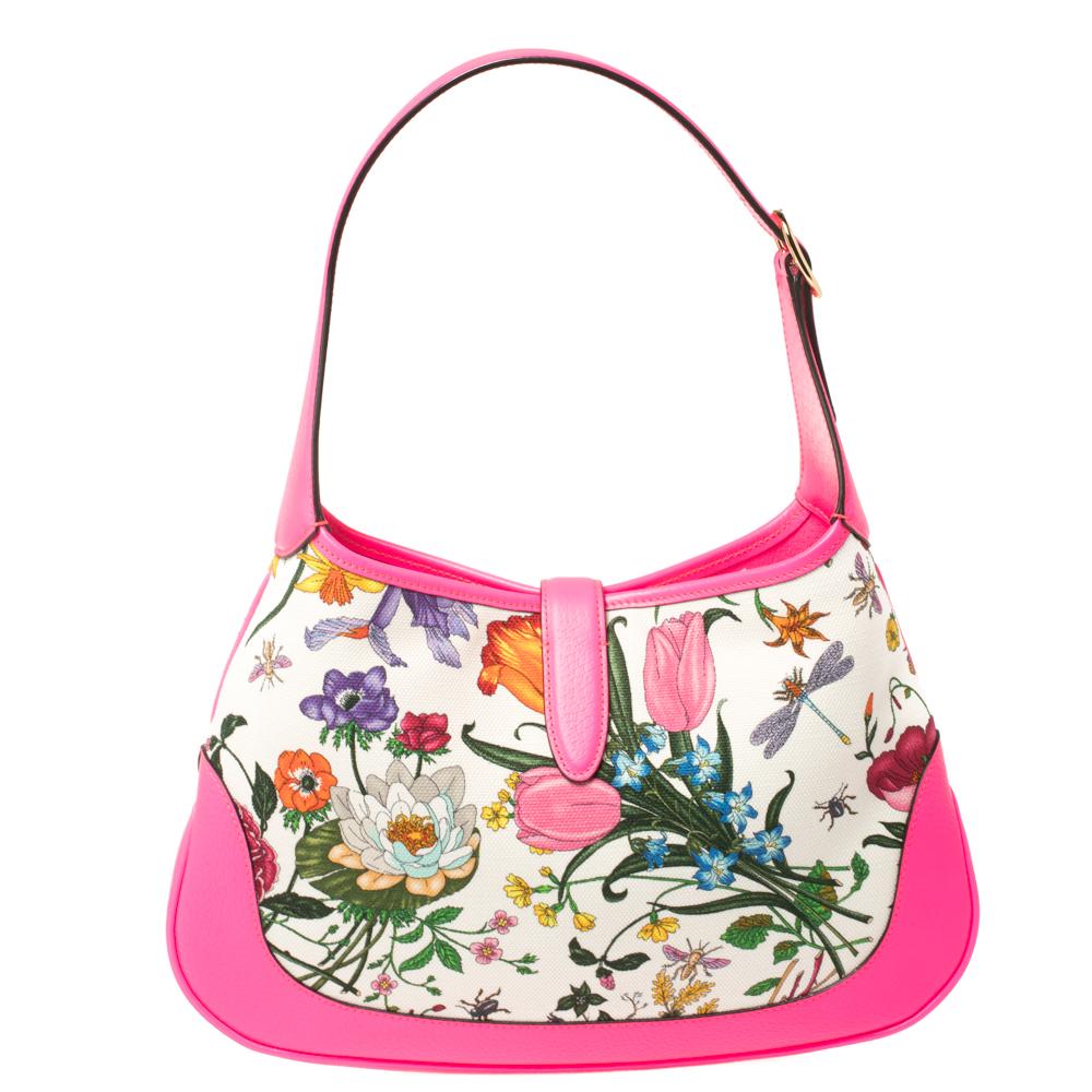 Gucci has always offered a line-up for cult accessories, just like this Jackie hobo originally designed in 1958 as a tribute to Jacqueline Kennedy Onassis. The canvas is printed with colorful blooms, while the contrasting leather edging gives it