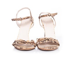 Gucci, Neutral colored python sandal.