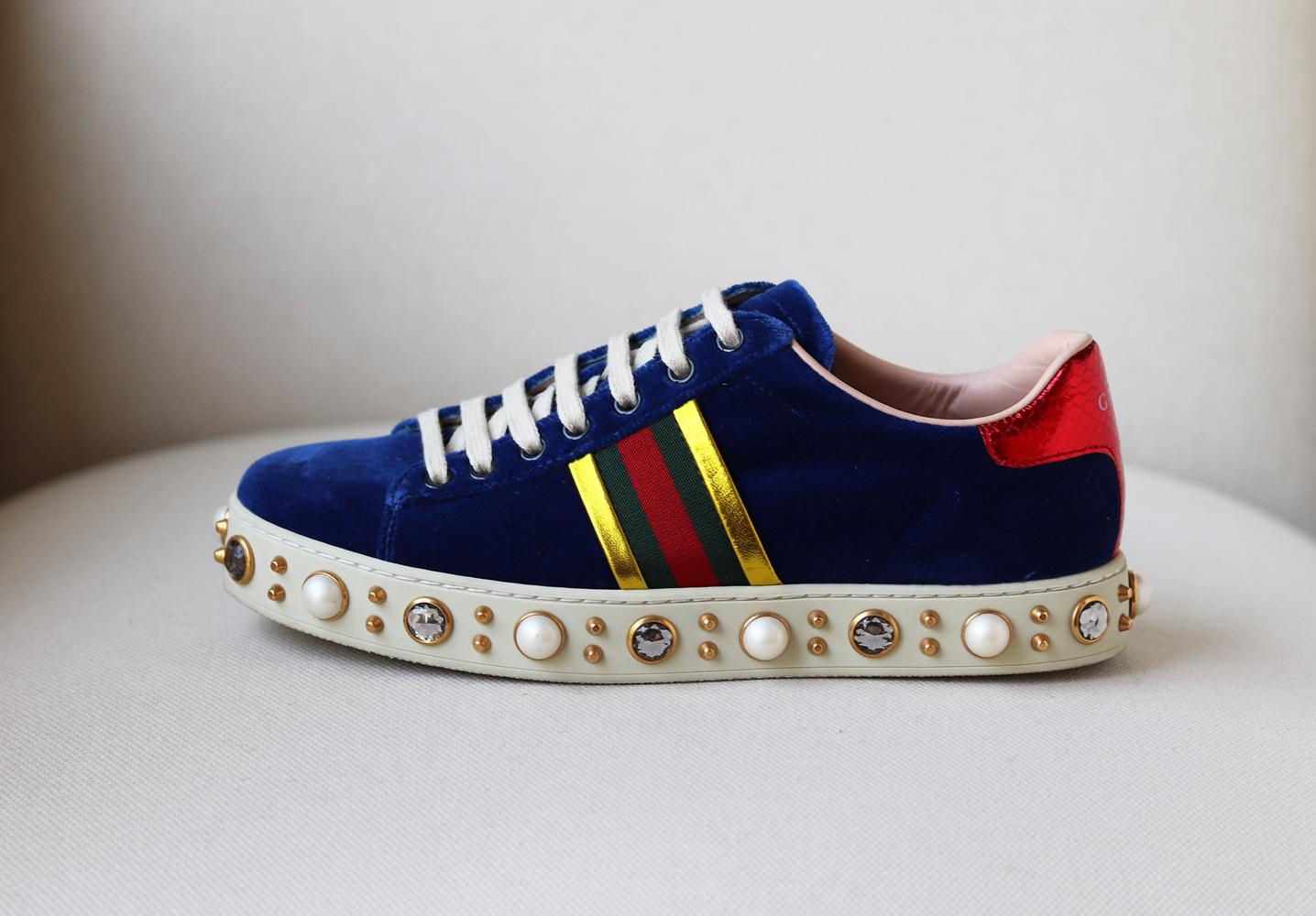 These Gucci sneakers are made from bright-blue velvet, this low-top pair is trimmed with faux-pearl and crystal along the platform soles along with the label's signature webbing with metallic leather trim. 
Sole measures approx. 20 mm/1 inches.
Blue