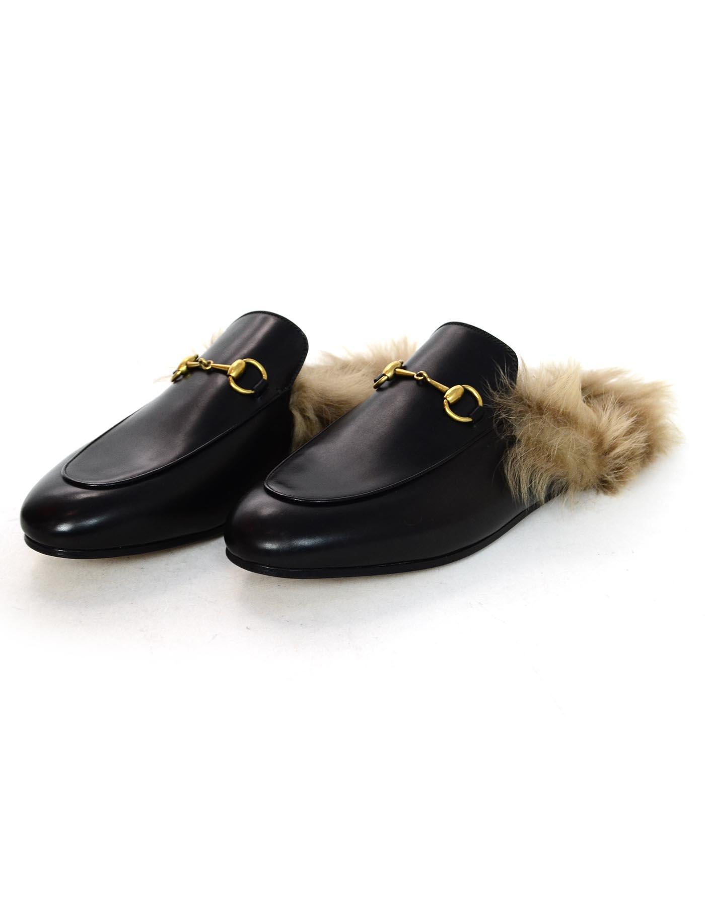 Gucci New Black Leather Princetown Slippers W/ Lamb Fur & Brass Horsebit Sz 39.5

Made In: Italy
Color: Black, taupe 
Hardware: Brass
Materials: Leather, lamb fur, metal
Closure/Opening:  Slide on
Overall Condition: Like new condition with exception
