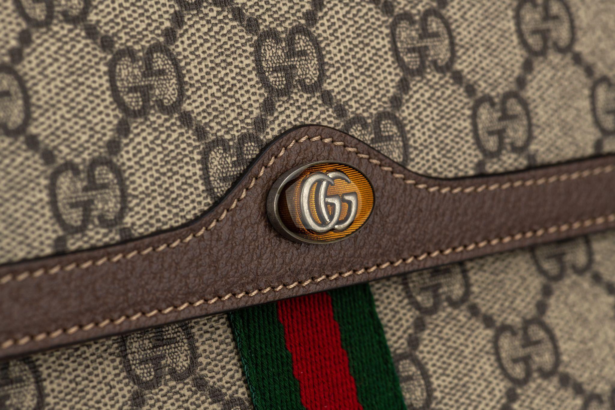 Gray Gucci New Brown Logo GG Clutch W/Box For Sale