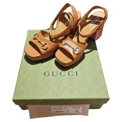Gucci new camel sandals with stirrup buckle 2024