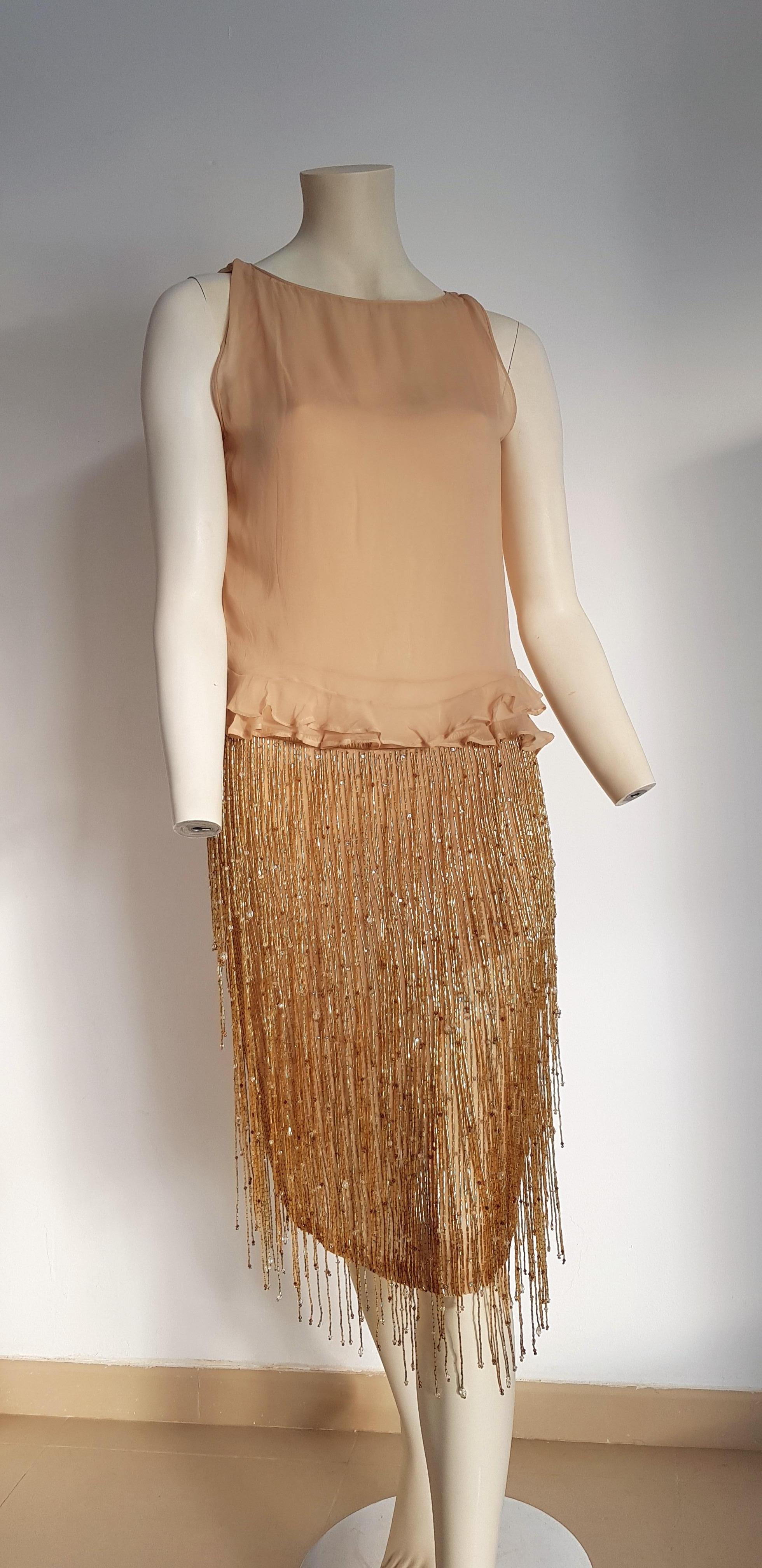 GUCCI Haute Couture Swarovski Diamonds Beaded Silk Top Skirt  - Unworn, New with tags.

SIZE: equivalent to about S/M, please review approx measurements as follows in cm. 
TOP: lenght 50, chest underarm to underarm 45, bust circumference 86,