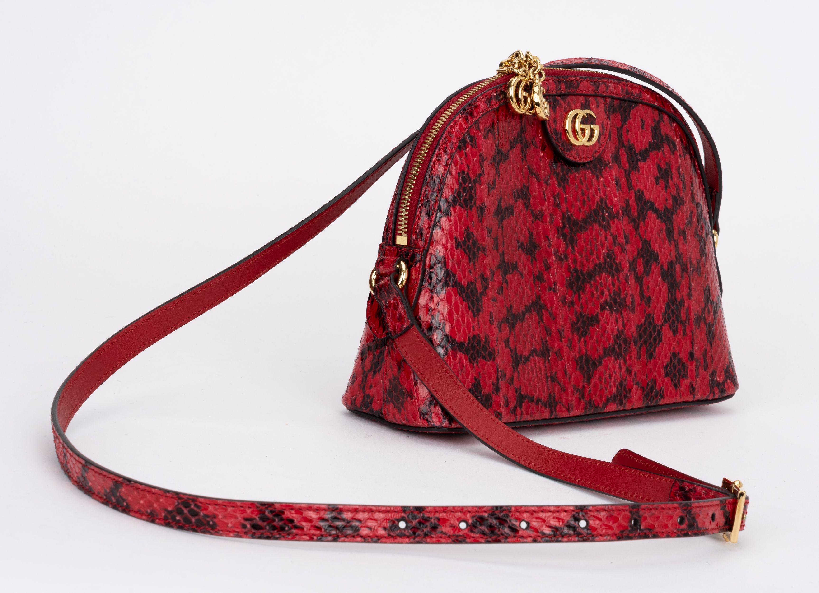 Gucci brand new red water snake leather bag, can be worn shoulder or cross body. 
Shoulder drop minimum 19